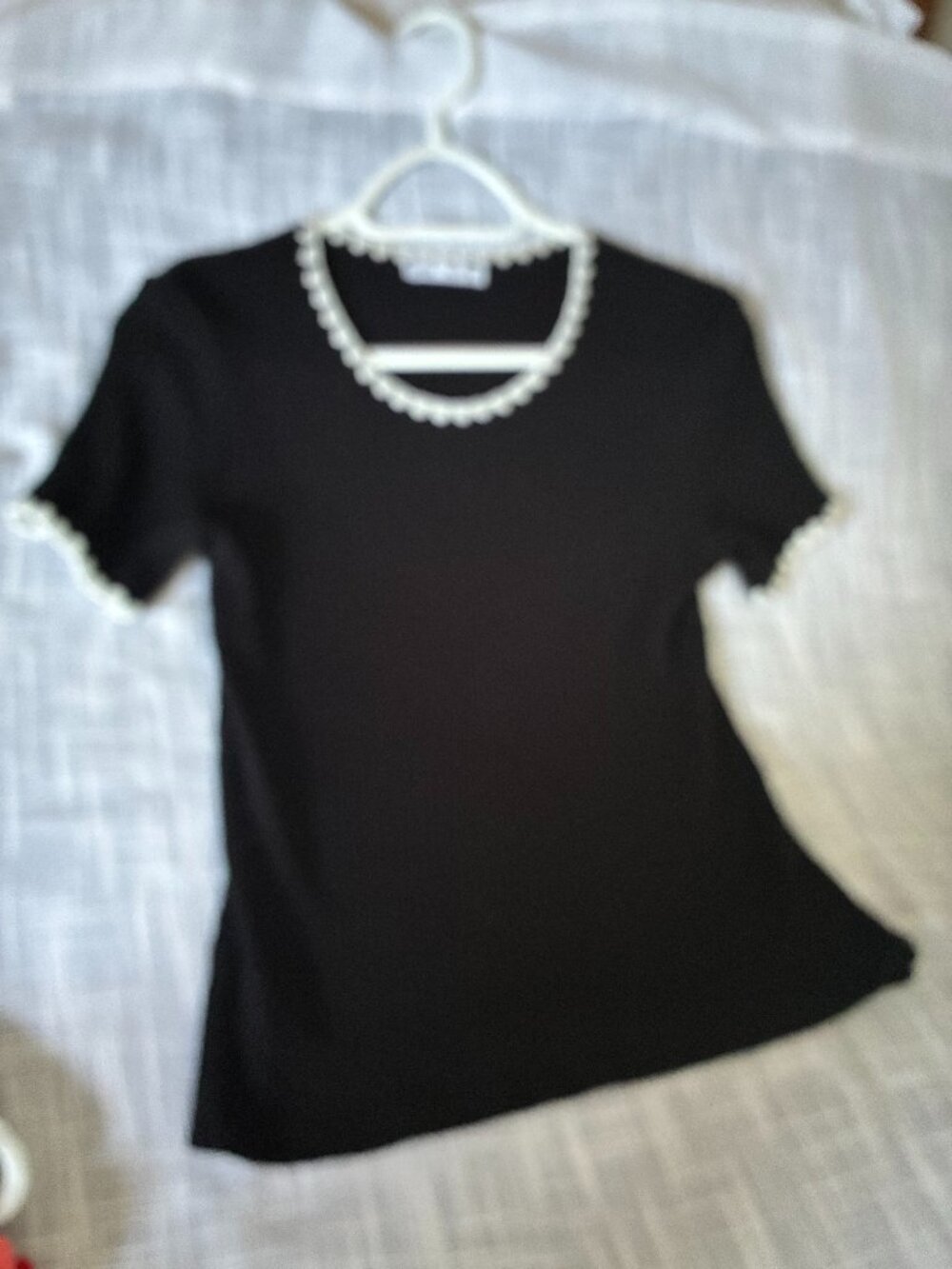Chandail en tricot noir Zara brodé blanc